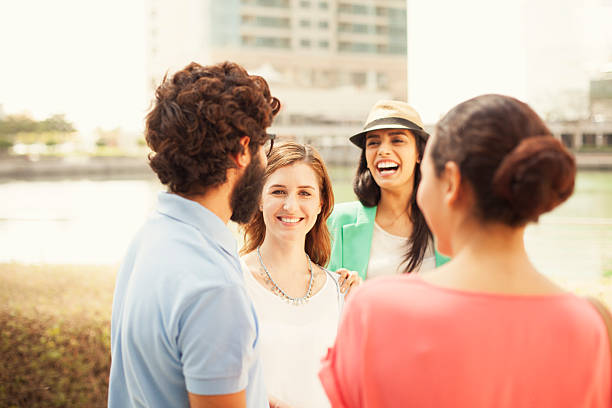 istock Young people  hanging out against cityscape 475175368