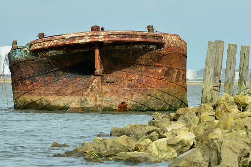 a old rusty shipwrecked boat at the riverside park, gillingham kent