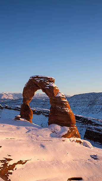 istock Delicate Arch in Winter at sunset (vertical) 475176557