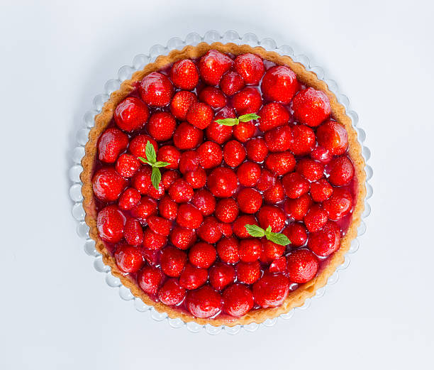 istock Strawberry cake with mint isolated on white 475177012
