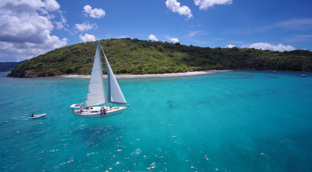 istock sailboat under full sails traveling through the Caribbean Sea 475177302