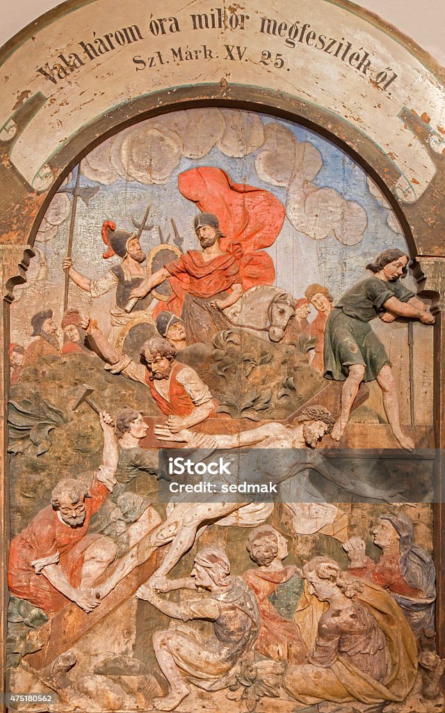 Banska Stiavnica - Jesus nailed to the cross relief Banska Stiavnica - The jesus nailed to the cross as the part of baroque Calvary from years 1744 - 1751 by Dionyz Stanetti.. 2015 Stock Photo