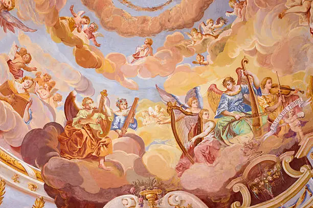 Banska Sitavnica - The detail of fresco on cupola in the middle church of baroque calvary by Anton Schmidt from years 1745. Angels with the music instruments.