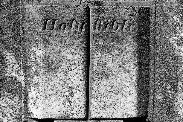 Words Holy Bible Carved on a Headstone