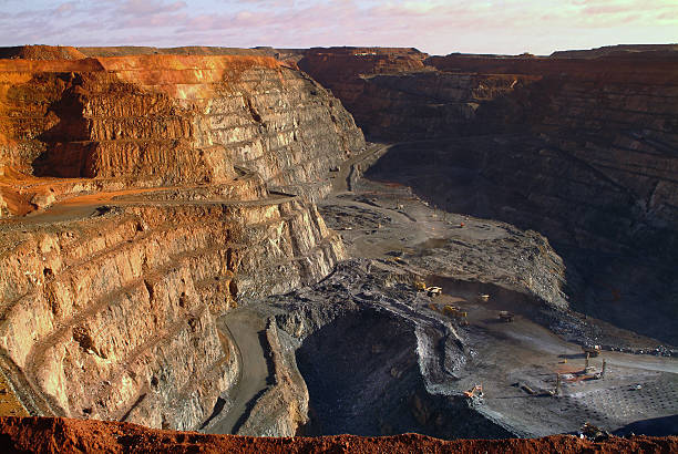 istock Wide angle aerial view of an open cut minesite. 475187103