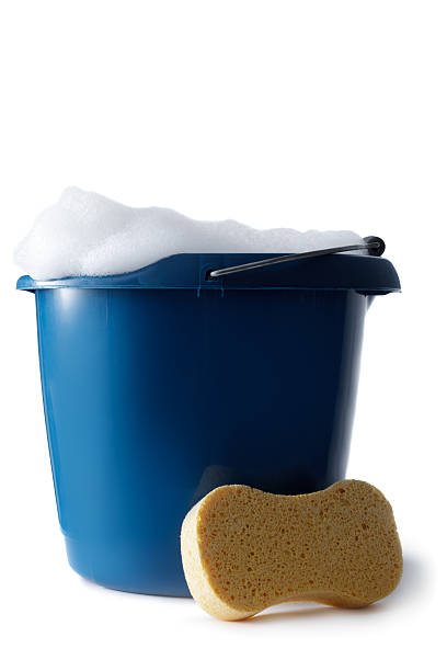 Cleaning: Bucket with Soap and Sponge Isolated on White Background More Photos like this here... bath sponge photos stock pictures, royalty-free photos & images