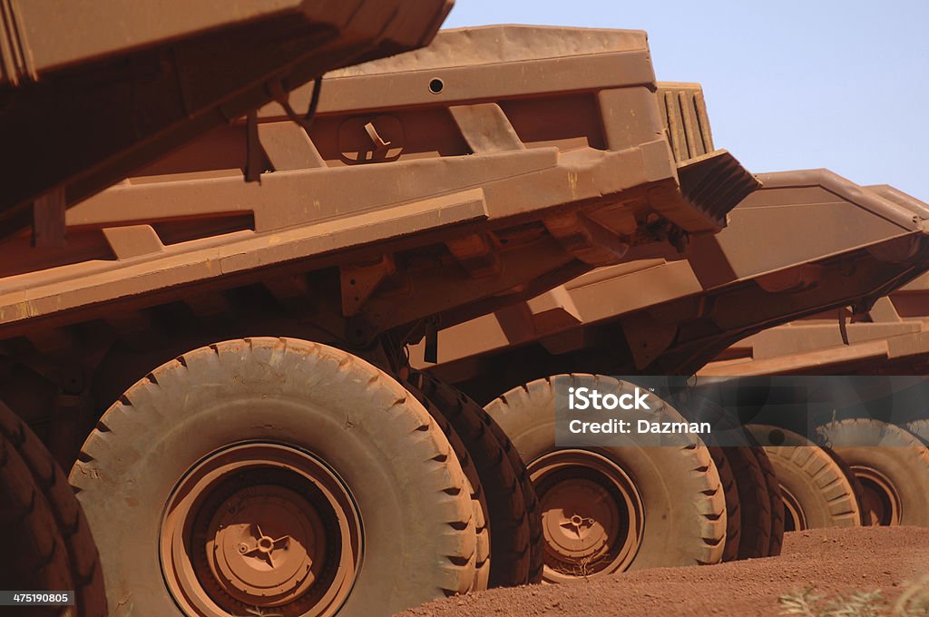 "Eine Reihe praktischer trucks geparkt. " - Lizenzfrei Bergbau Stock-Foto