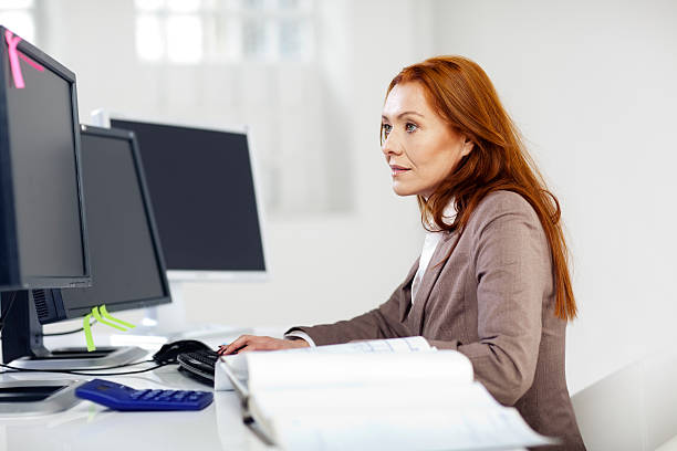 istock Business woman is working on a computer 475191679