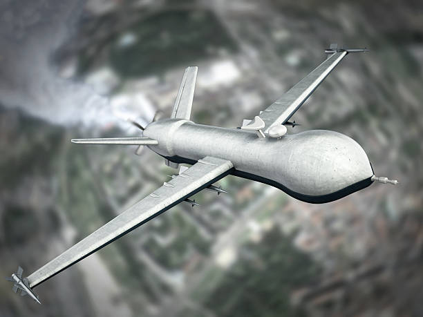 istock Armed predator drone flying above the land 475193524