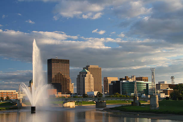 Water Fountain in River, Cityscape Skyline of Dayton, Ohio Water Fountain in River and Cityscape of Dayton, Ohio, USA. dayton ohio skyline stock pictures, royalty-free photos & images