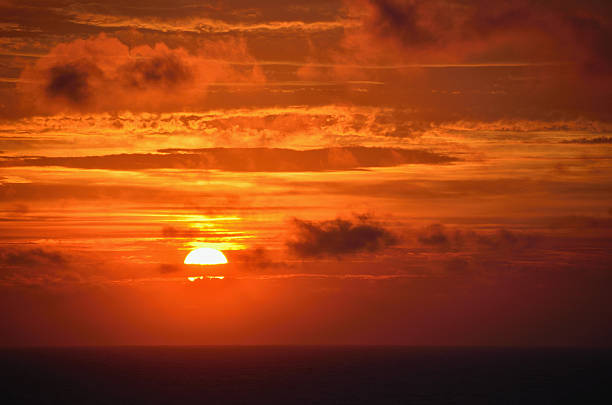 istock red sunset at sea 475198893