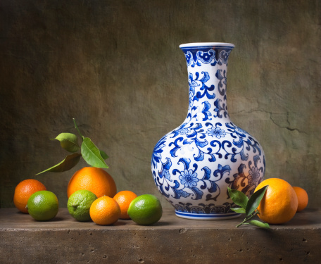 Still life with chinese vase and fruit