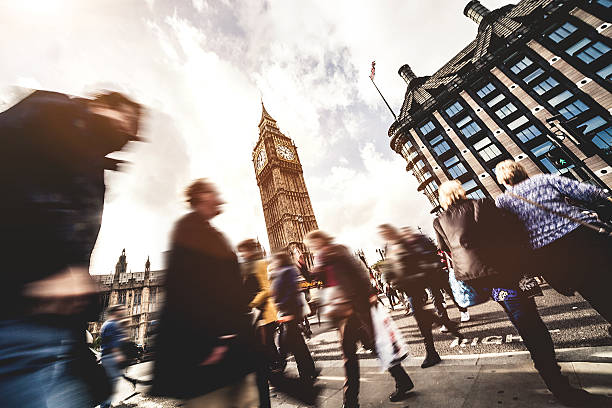 istock People crossing in Central London 475201031