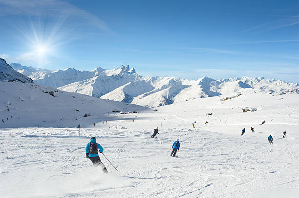 istock Skiers enjoy in the mountain on a sunny day 475203541