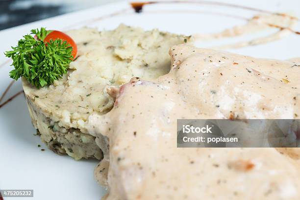 Meat With Cream Sauce Close Up Stock Photo - Download Image Now - 2015, Arranging, Beef