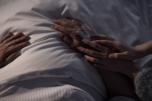 istock Touching hands of mum 475205950