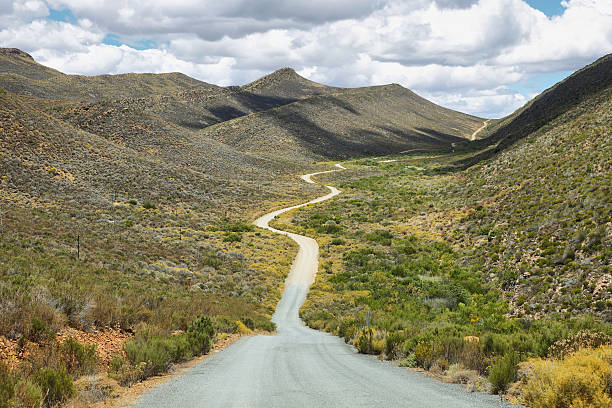 Deserted road into Cederberg nature reserve Deserted road into Cederberg nature reserve, South Africa. cederberg mountains photos stock pictures, royalty-free photos & images