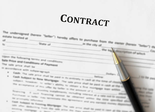 Contract management with pen stock photo