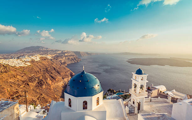 istock High angle view of Santorini blue dome churches, Greece 475209328