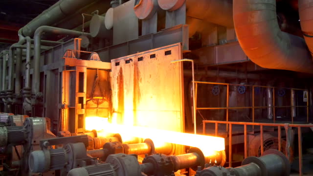 working steel rolling factory interior, real time.