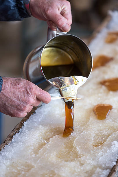 istock Maple Sugar Taffy on Snow at Sugar Shack 475211214