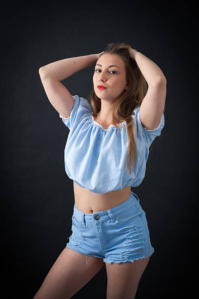 istock Beautiful girl doing different expressions in different sets of clothes 475211382