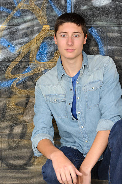 istock Teenage Boy with Grafitti Wall 475218707