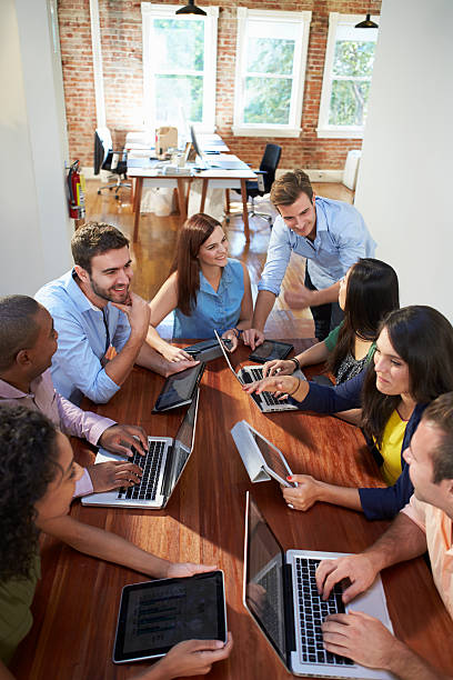 istock Group Of Office Workers Meeting To Discuss Ideas 475218755