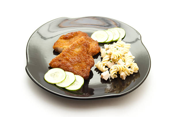 Fresh Breaded and Baked Slices from Beef with Cucumber