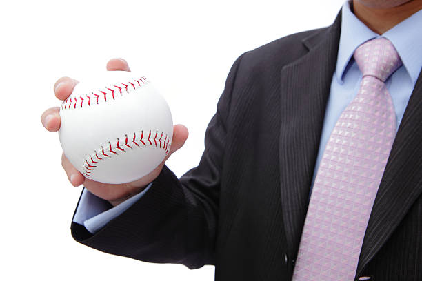 istock Business man hand holding baseball 475221301