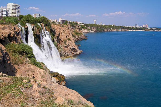 Wonderful rainbow on Duden river Waterfall  in Antalya, Turkey stock photo