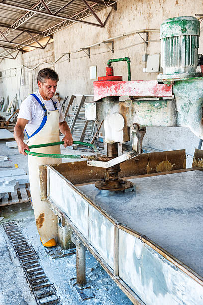 istock Male Worker on Marble or Granite Bevel 475221841