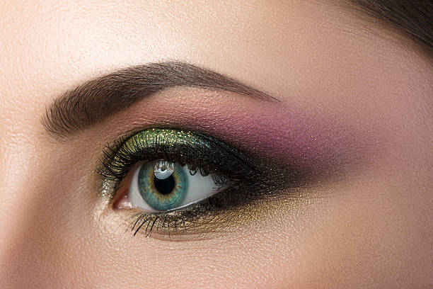 istock Close-up view of blue female eye 475223596