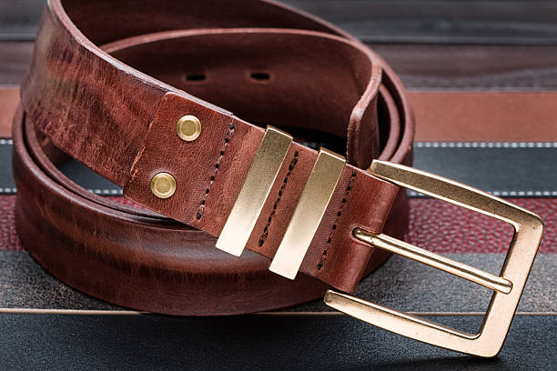 istock Brown men leather belt with golden buckle 475223888