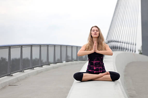 istock Resting and meditating in yoga position on the bridge 475228602