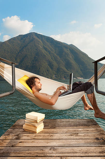 istock portrait of a young man in the hammock 475229129