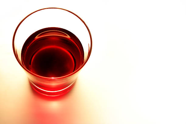 istock Red wine glass vintage tone style on paper background, 475230126