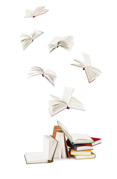 istock stack of old books and flying books isolated on white 475230650