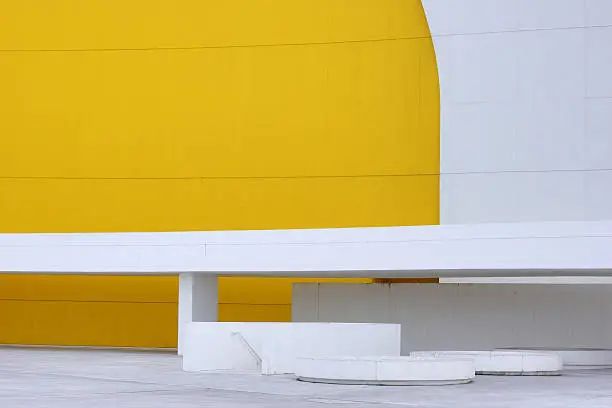 Facade of a building of modernarchitecture with yellow and white colours