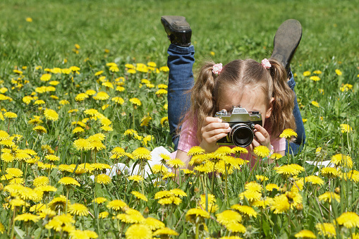 Child photographing nature
