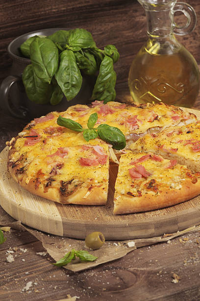 istock Pizza with Ham and Mushrooms 475240359