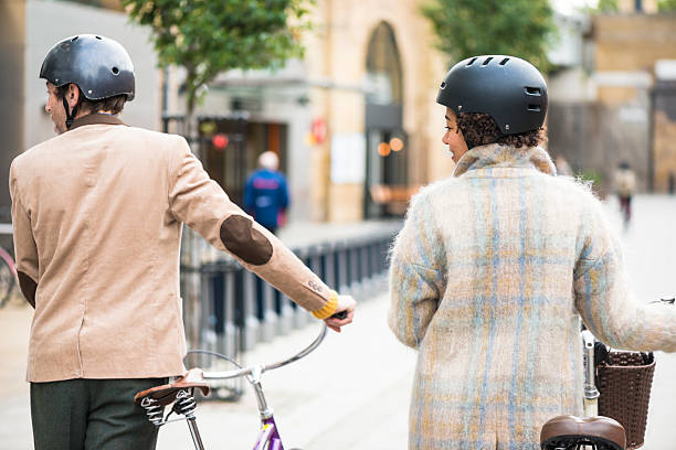 istock Man and woman with bike 475243561