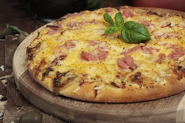 istock Pizza with Ham and Mushrooms 475244135