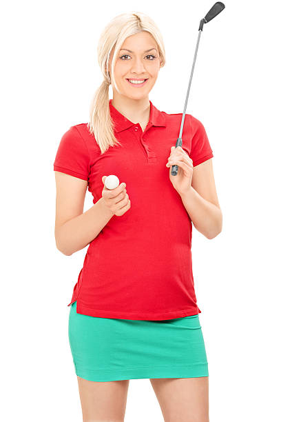 istock Blond female golfer holding a golf club 475244168