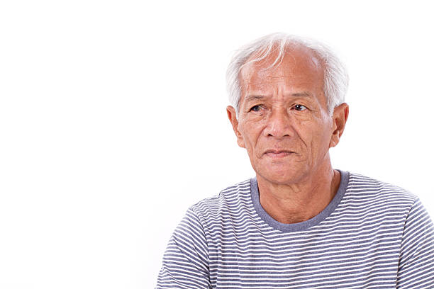 istock old senior man suffering from eye disease, surfer's eye, pterygi 475247430
