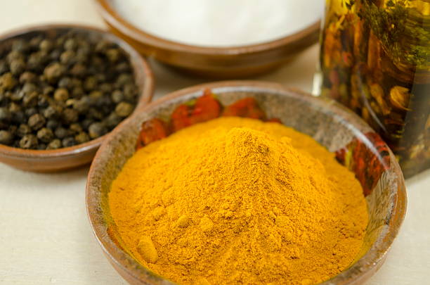 istock Curry , pepper and olive oil on a table 475248326