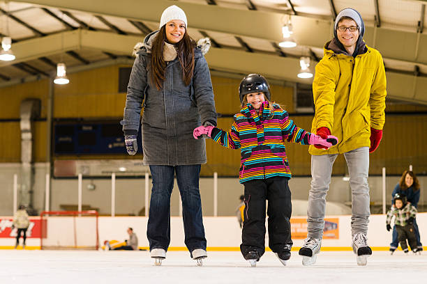istock People having fun on skating rink 475248473