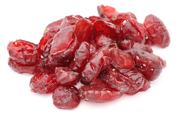 istock Dry cranberries pile on white background 475248965