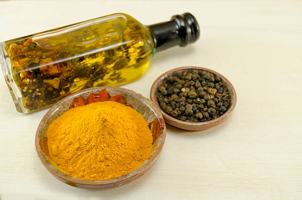 istock Curry , pepper and olive oil on a table 475251134