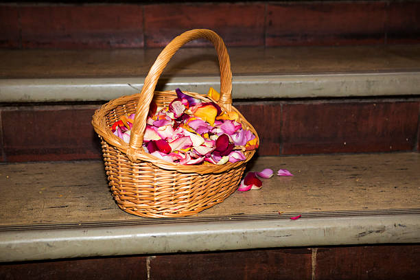 basket full of petals sitting on stairs